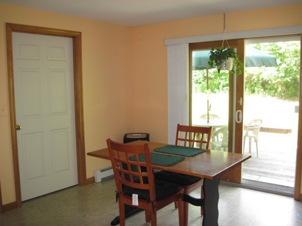 66 Old Poor Farm Road Ware, MA 01082 - Photo 13 of 26 a view of a dining room with furniture and window