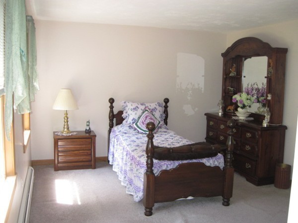 66 Old Poor Farm Road Ware, MA 01082 - Photo 16 of 26 a bedroom with a bed and a dresser