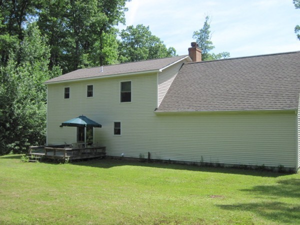 66 Old Poor Farm Road Ware, MA 01082 - Photo 4 of 26 a view of a house with a backyard