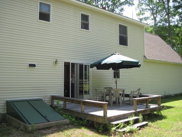66 Old Poor Farm Road Ware, MA 01082 - Photo 5 of 26 a view of backyard with a patio