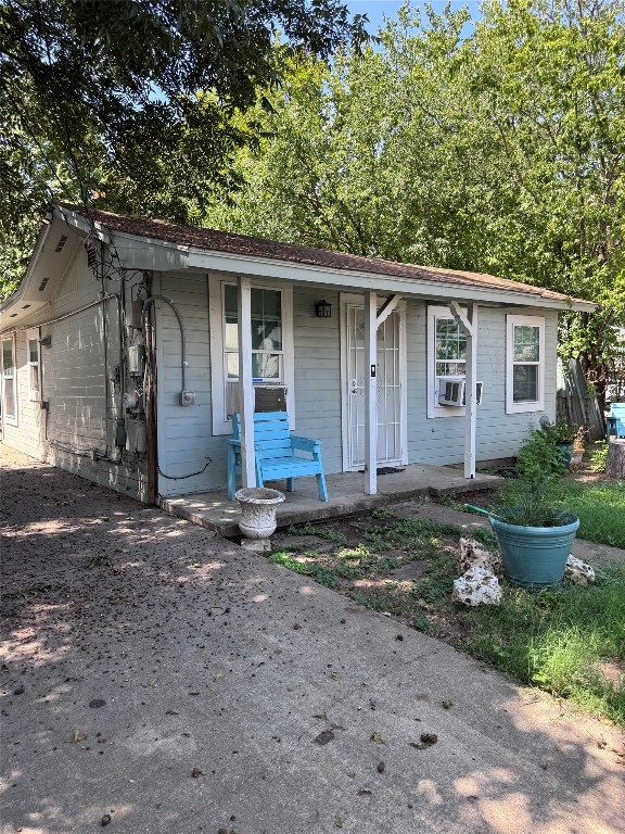 2209 East 5th Street Austin, TX 78702 - Photo 17 of 17 a front view of a house with garden