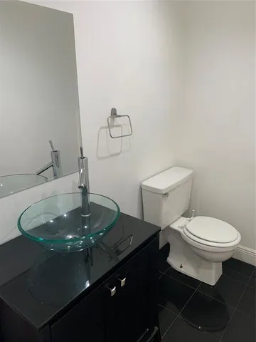 a bathroom with a sink and a toilet