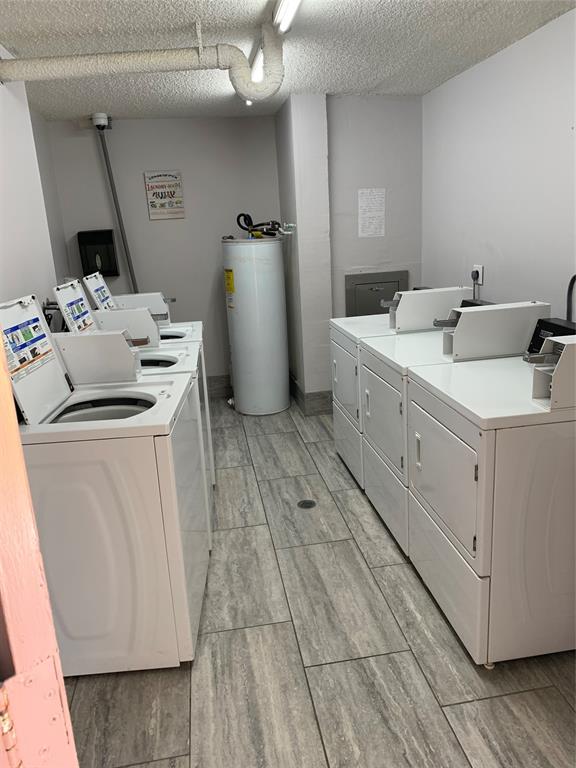 9355 Southwest 8th Street, Unit 321 Boca Raton, FL 33428 - Photo 9 of 15 a room with storage and utility