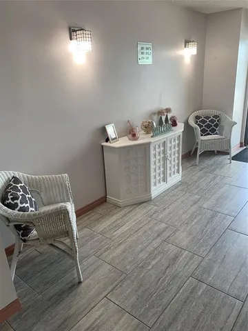 a room with furniture and window