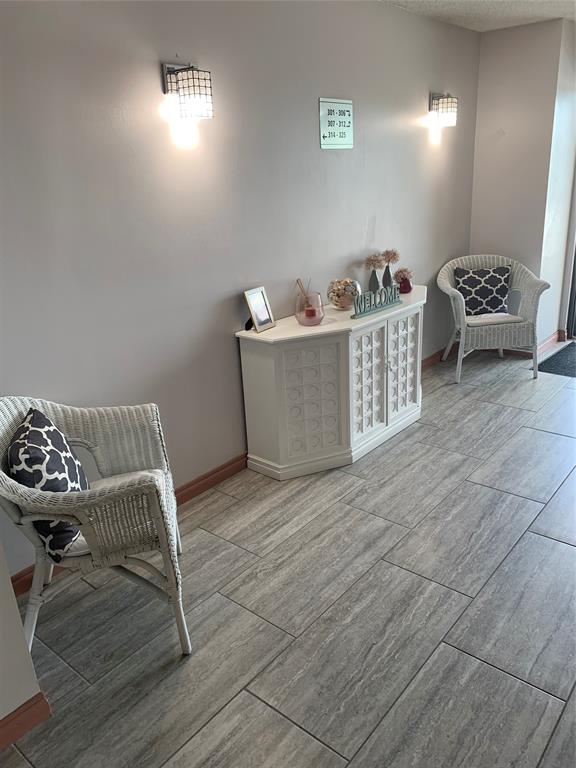 9355 Southwest 8th Street, Unit 321 Boca Raton, FL 33428 - Photo 10 of 15 a room with furniture and window