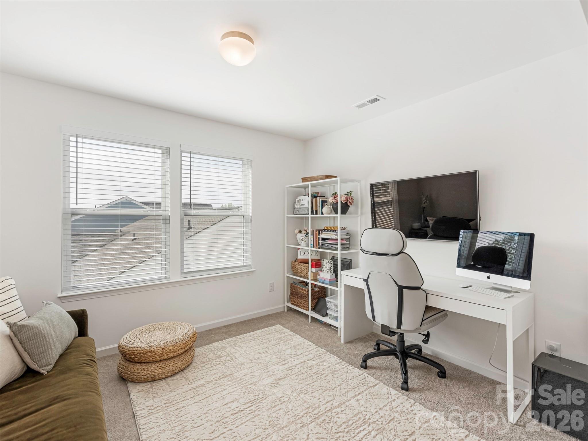 966 Scotch Meadows Loop Monroe, NC 28110 - Photo 24 of 48 a view of a livingroom with workspace and a window