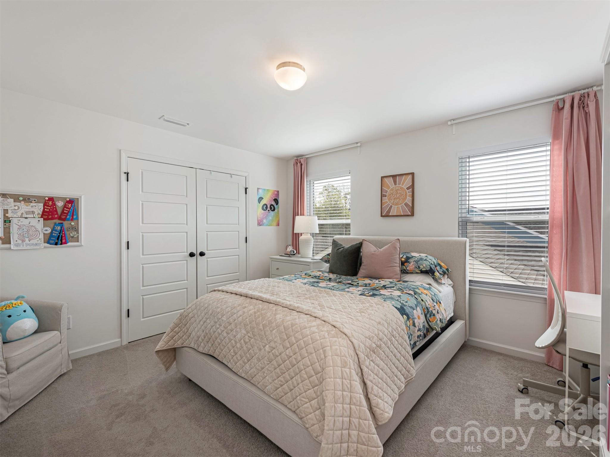 966 Scotch Meadows Loop Monroe, NC 28110 - Photo 28 of 48 a bedroom with a bed and a window