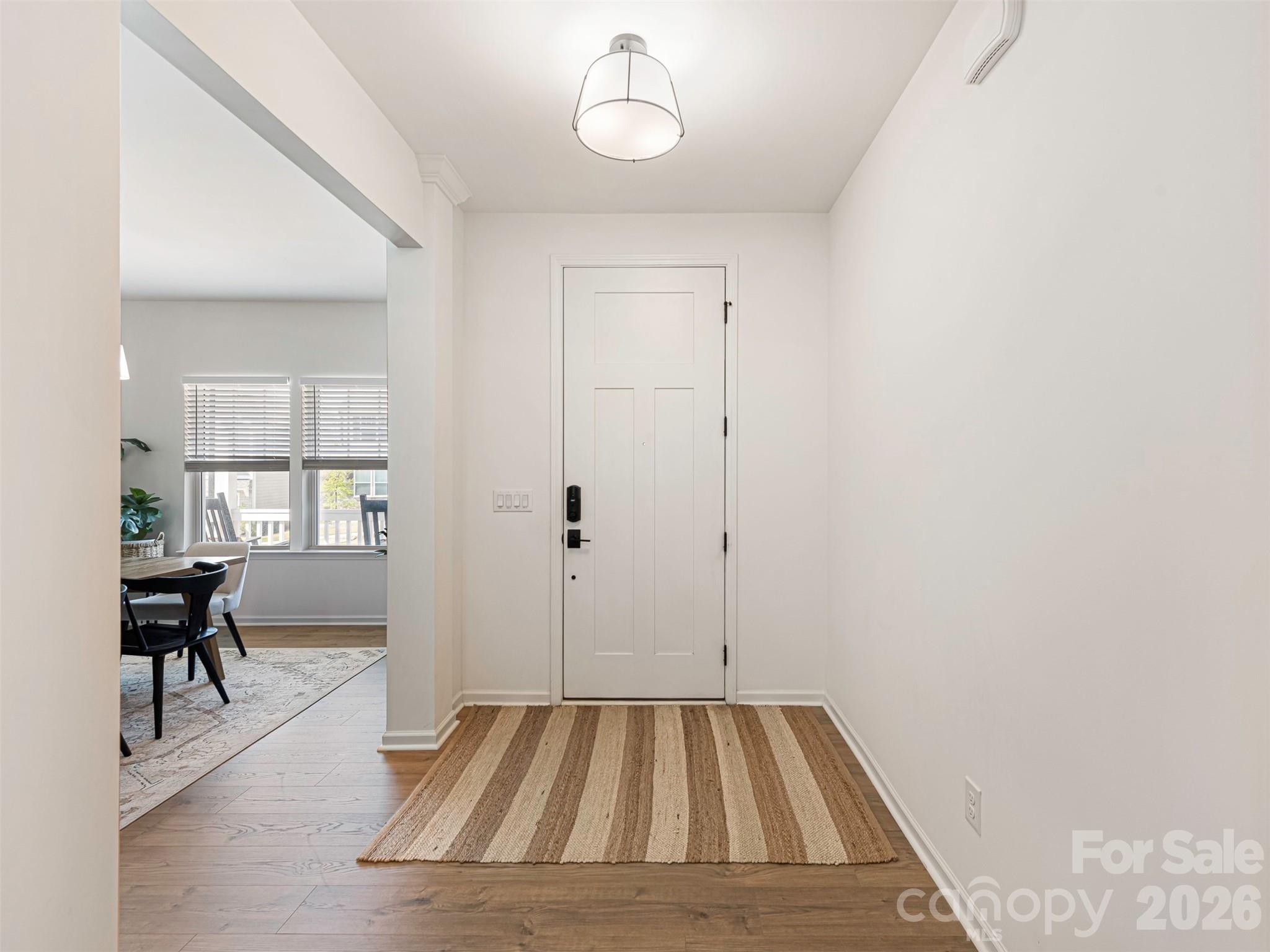 966 Scotch Meadows Loop Monroe, NC 28110 - Photo 4 of 48 a view of a livingroom with furniture and a window