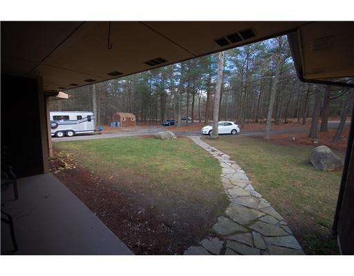 75 Tripps Corner Road Exeter, RI 02822 - Photo 8 of 20 Exterior Front. Looking out from covered front porch onto circular driveway