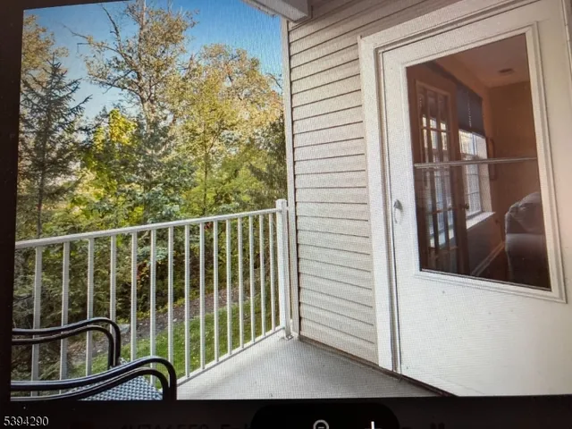 a kitchen with a sink and a refrigerator
