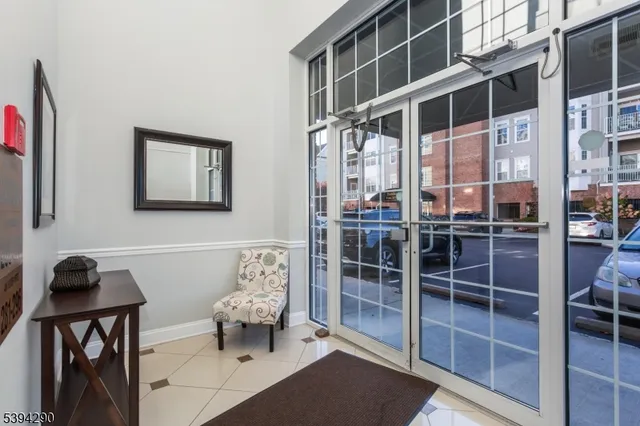 a view of living room with furniture and window