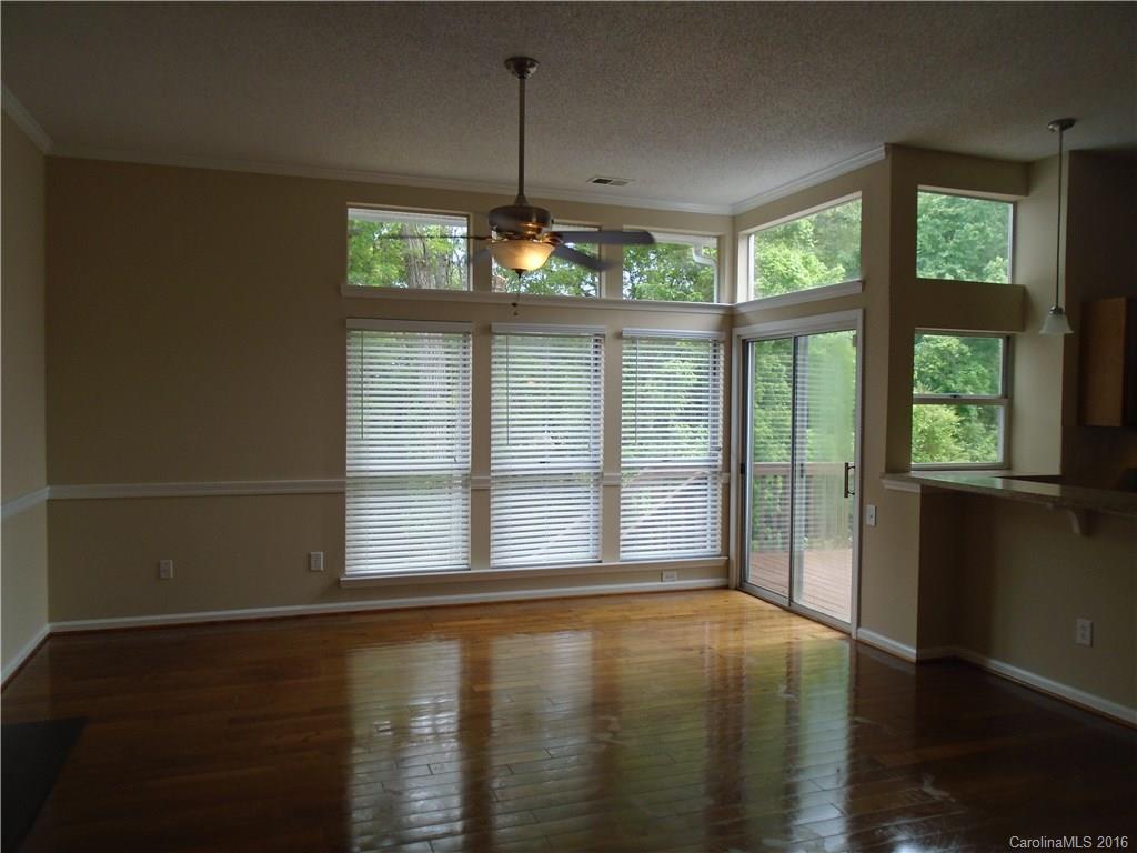3323 Chistow Road Matthews, NC 28105 - Photo 4 of 12 a view of an empty room with a window
