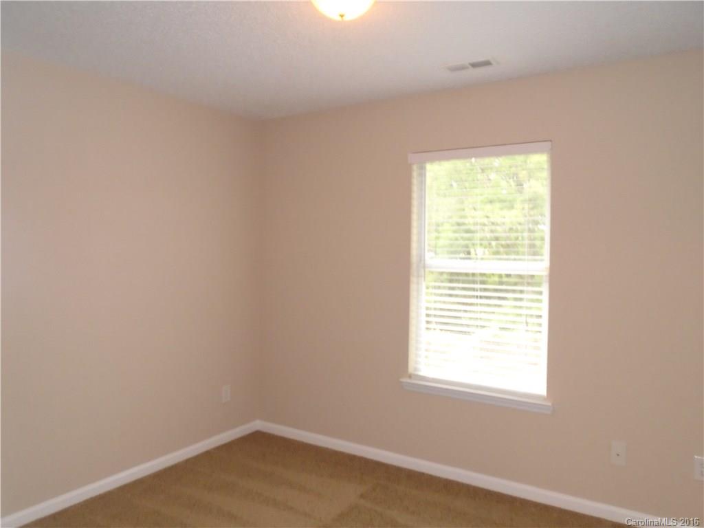 3323 Chistow Road Matthews, NC 28105 - Photo 9 of 12 an empty room with a window