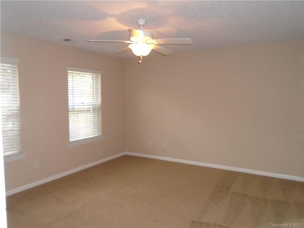 3323 Chistow Road Matthews, NC 28105 - Photo 10 of 12 an empty room with a window