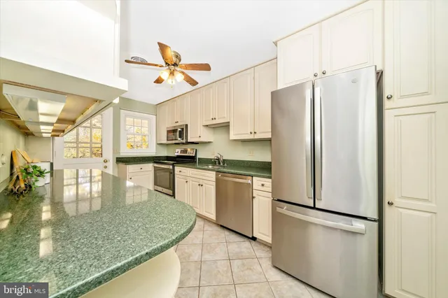 a view of livingroom with furniture and windows