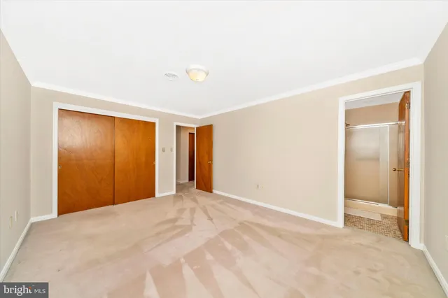 a kitchen with granite countertop a sink and cabinets