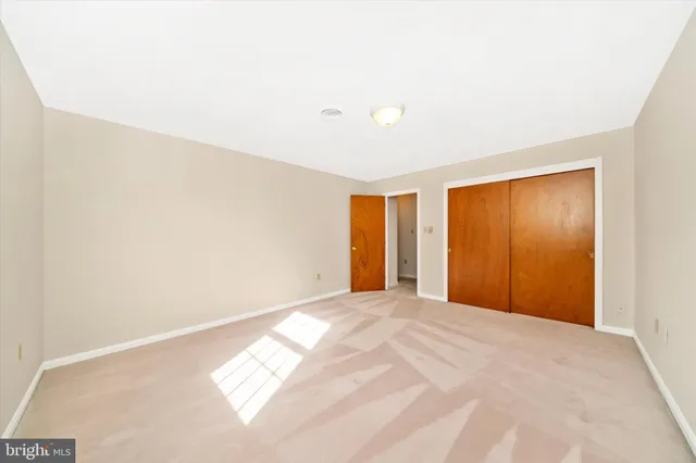 a view of a room with a window