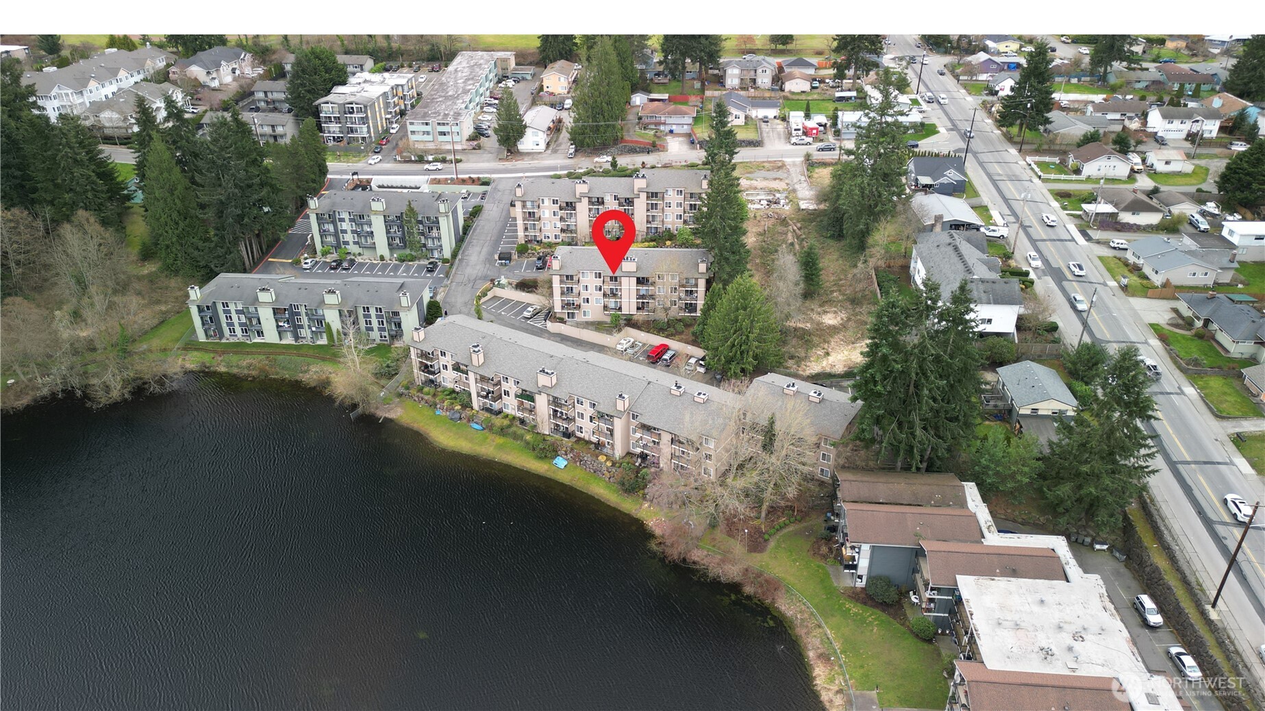 323 75th Street Southeast, Unit B11 Everett, WA 98203 - Photo 1 of 26 an aerial view of residential houses with outdoor space