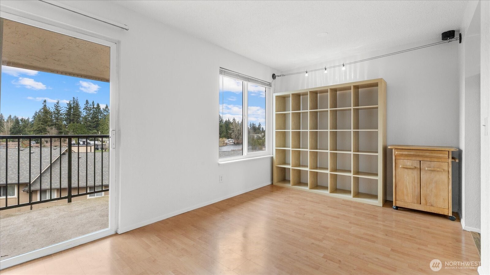 323 75th Street Southeast, Unit B11 Everett, WA 98203 - Photo 19 of 26 a view of empty room with wooden floor and windows