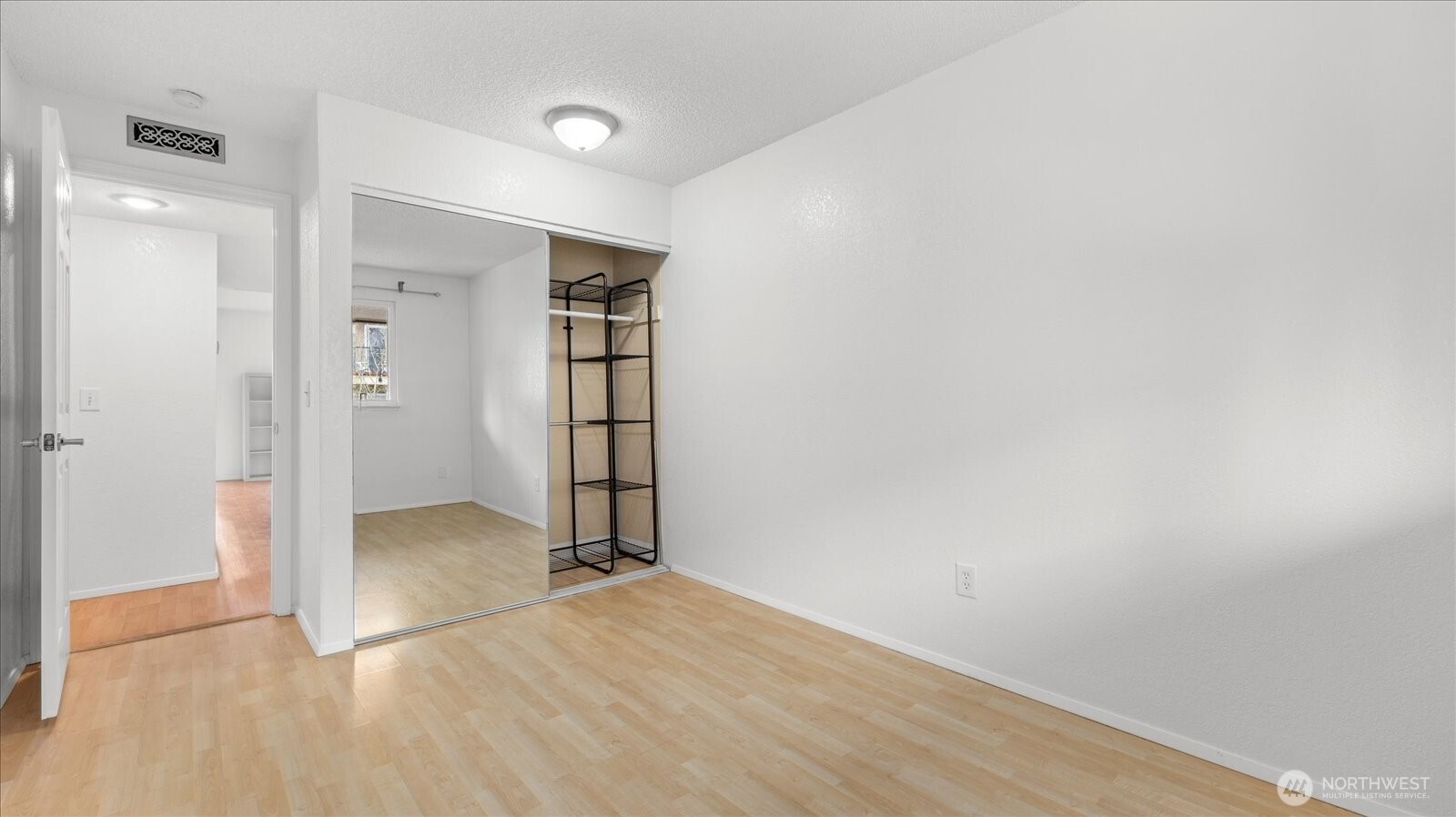 323 75th Street Southeast, Unit B11 Everett, WA 98203 - Photo 21 of 26 wooden floor in an empty room