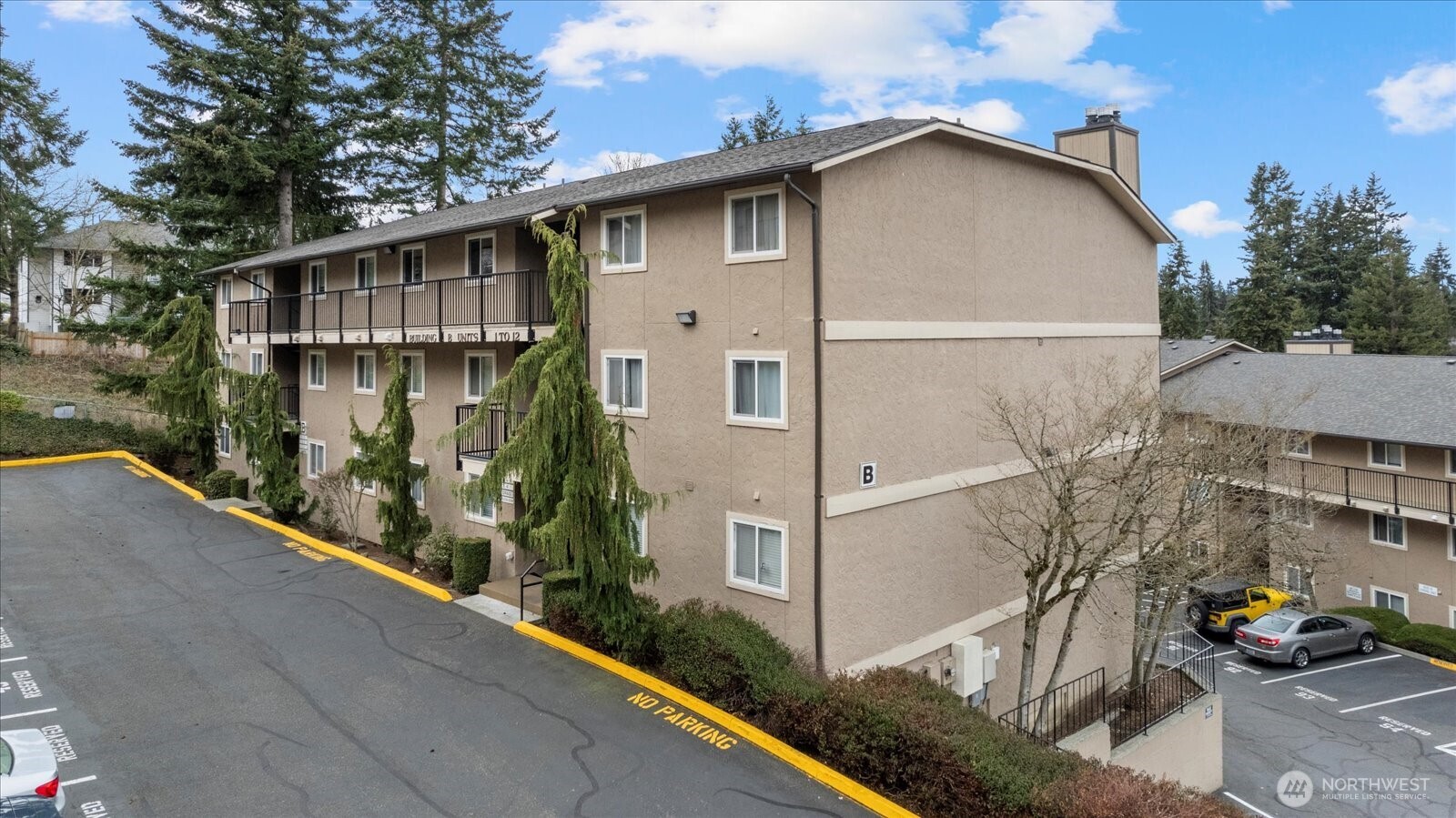 323 75th Street Southeast, Unit B11 Everett, WA 98203 - Photo 23 of 26 a view of a street with house