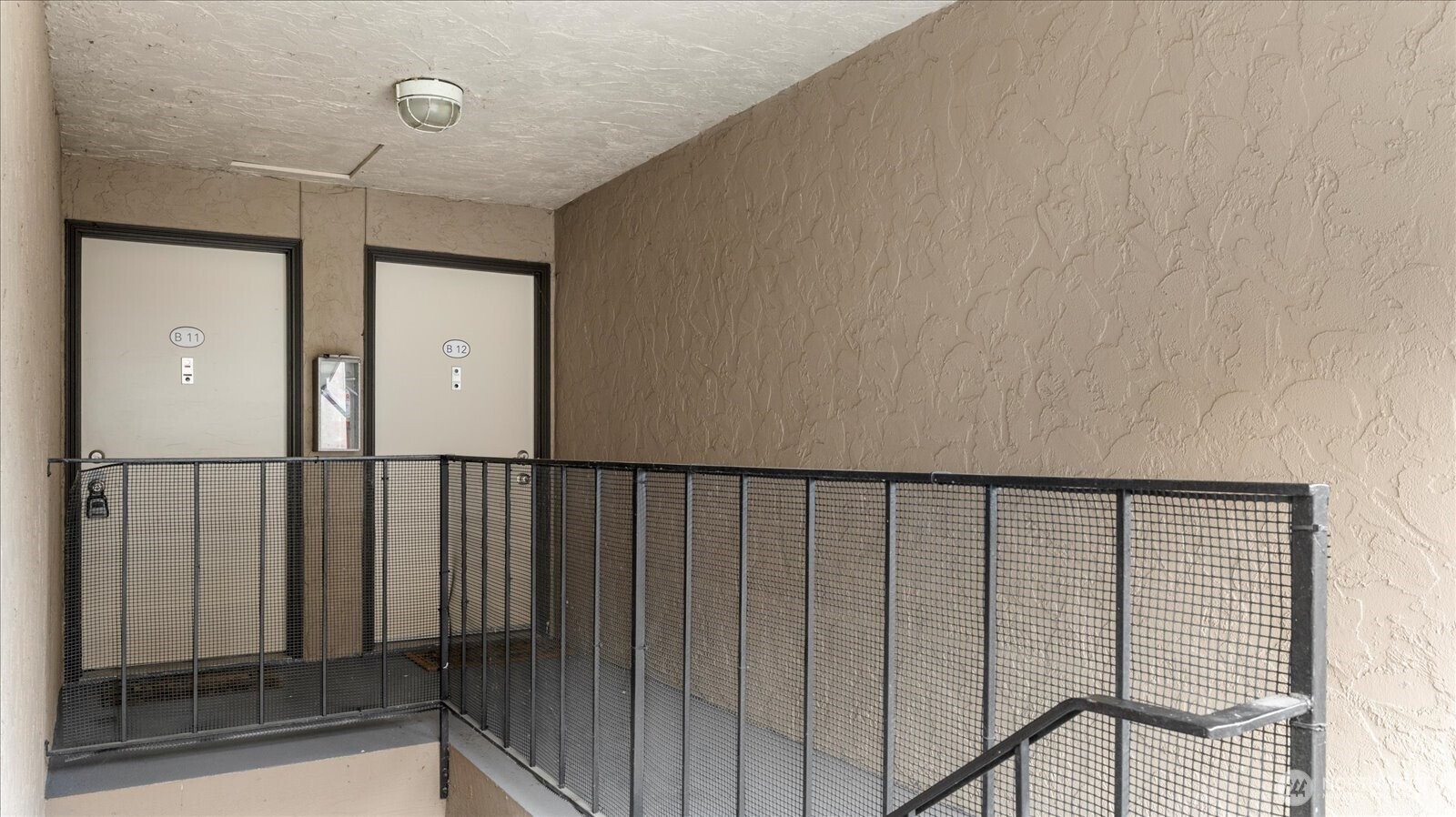 323 75th Street Southeast, Unit B11 Everett, WA 98203 - Photo 25 of 26 a view of staircase with wooden floor