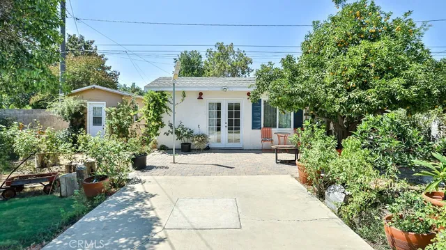 a view of a backyard with a garden