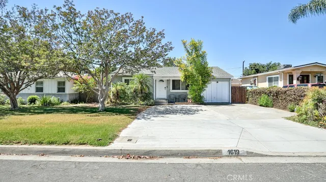 front view of house with a yard