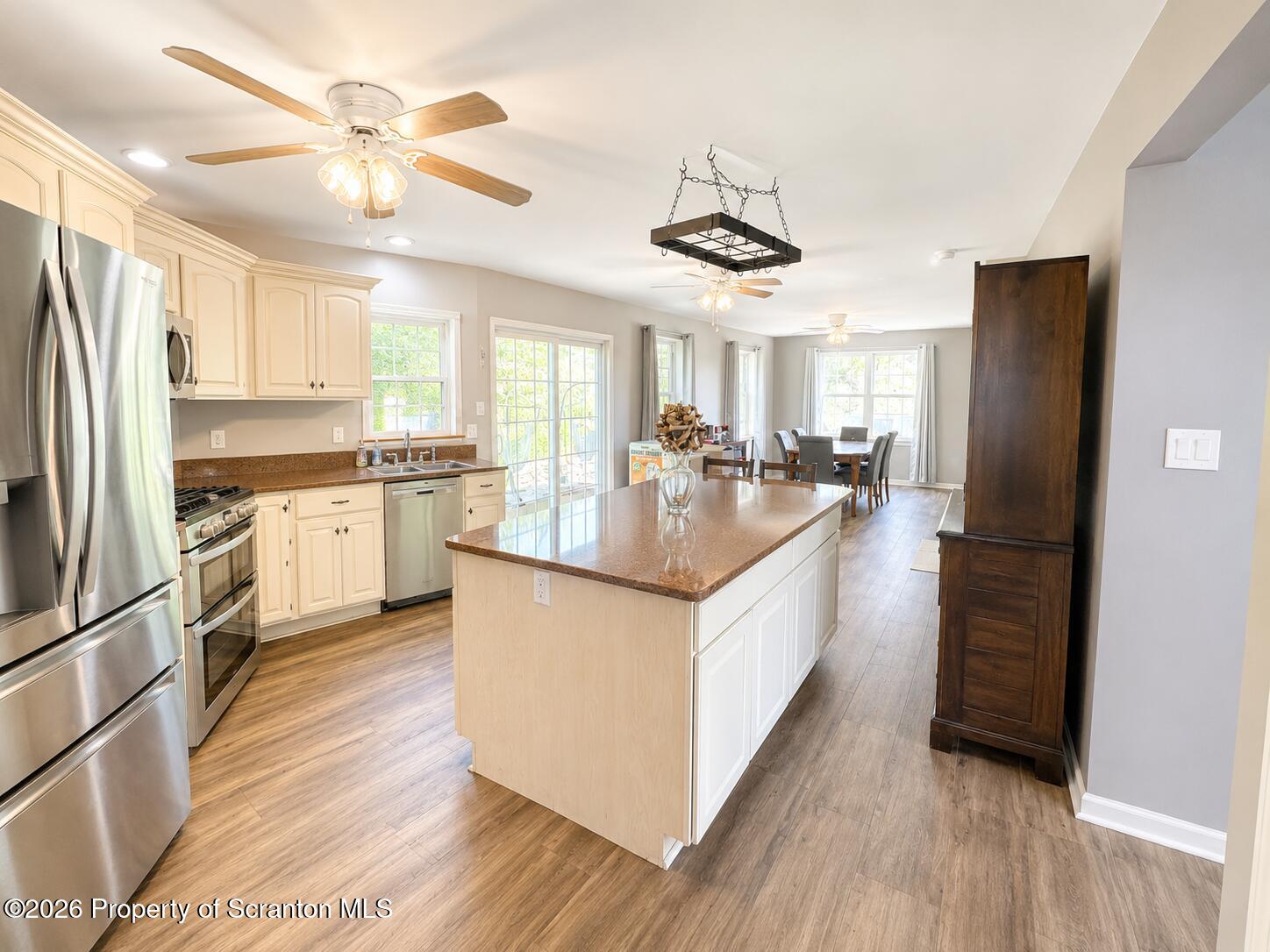 155 Baylor Road Nicholson, PA 18446 - Photo 24 of 53 a kitchen with stainless steel appliances granite countertop a refrigerator a stove a sink and a counter space
