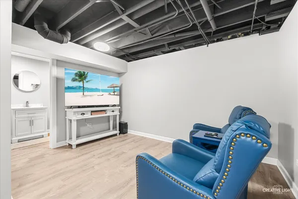 a room with furniture and a flat screen tv
