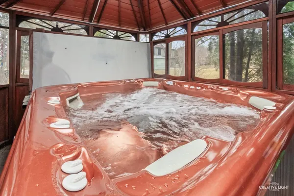 a view of a room with wooden floor