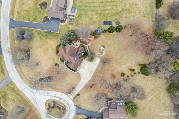 an aerial view of residential building with parking space