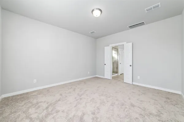 an empty room with an entryway