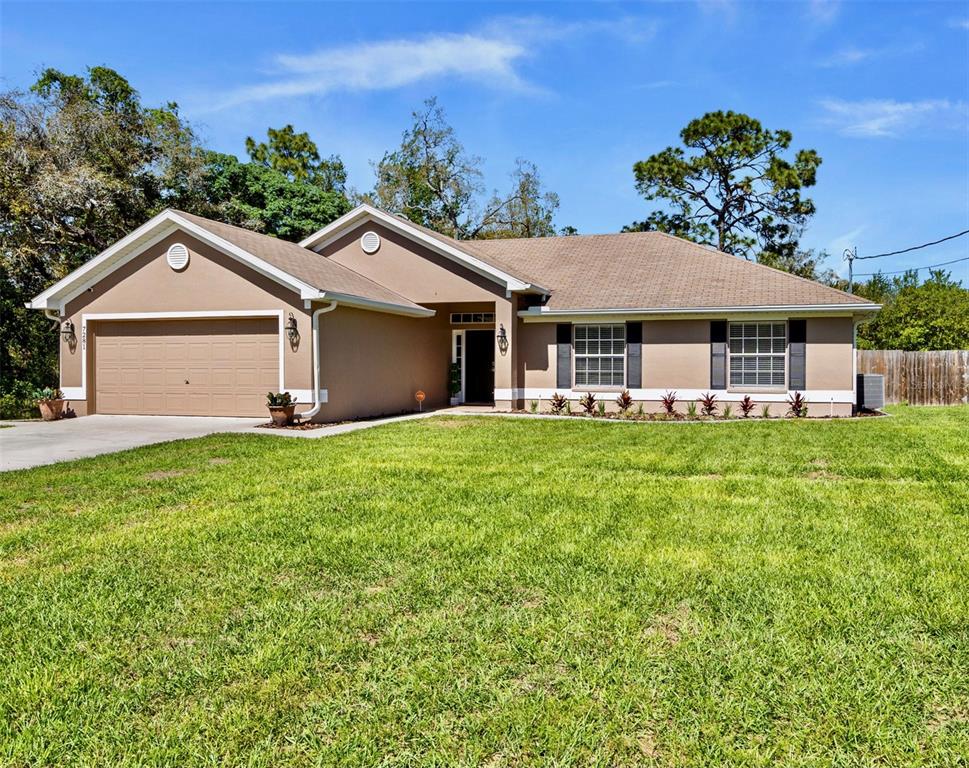 7281 Lagoon Road Spring Hill, FL 34606 - Photo 1 of 1 Front of home.