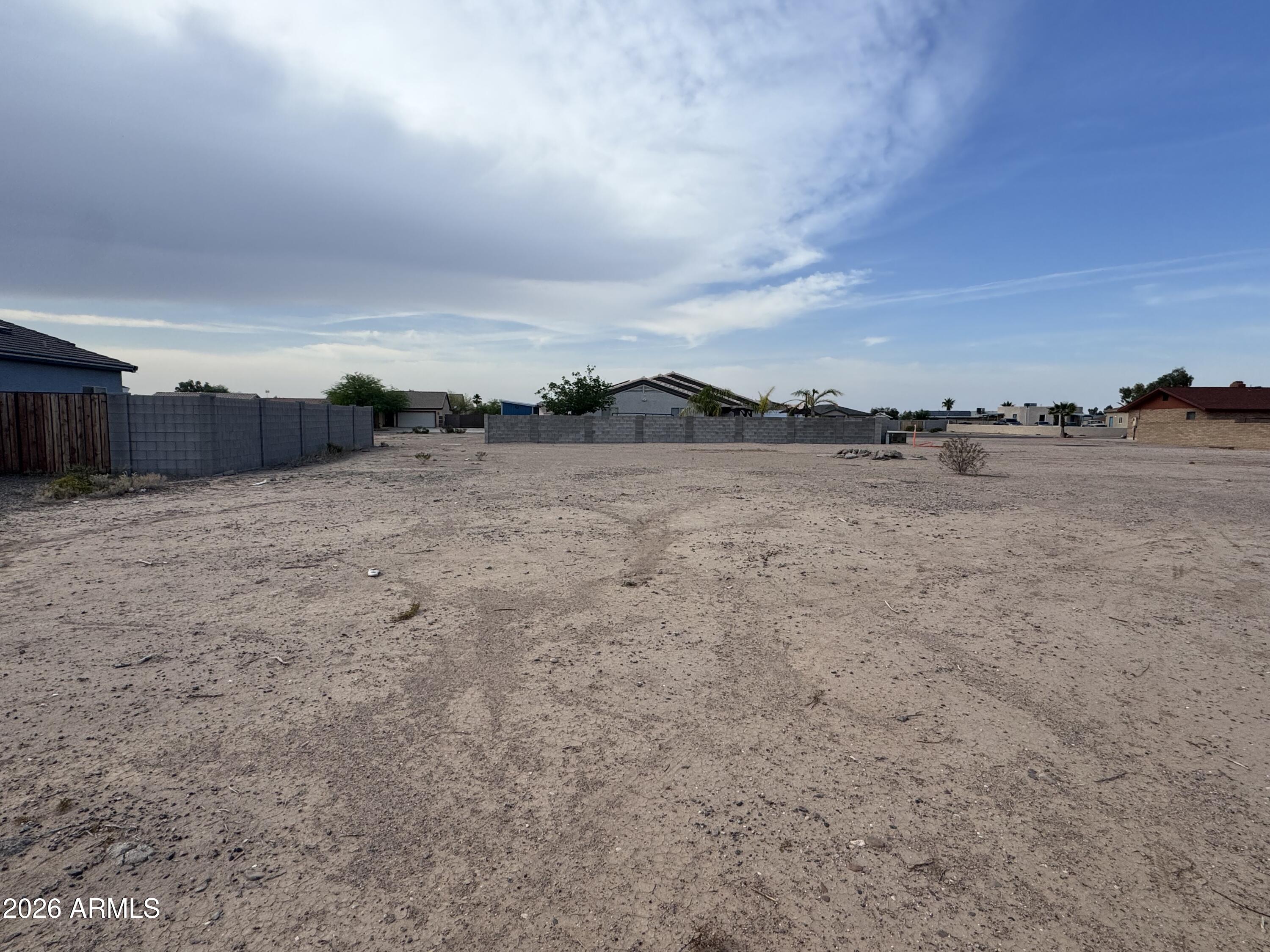13996 South Tampico Road, Unit 686 Arizona City, AZ 85123 - Photo 1 of 6 a view of an outdoor space and a houses
