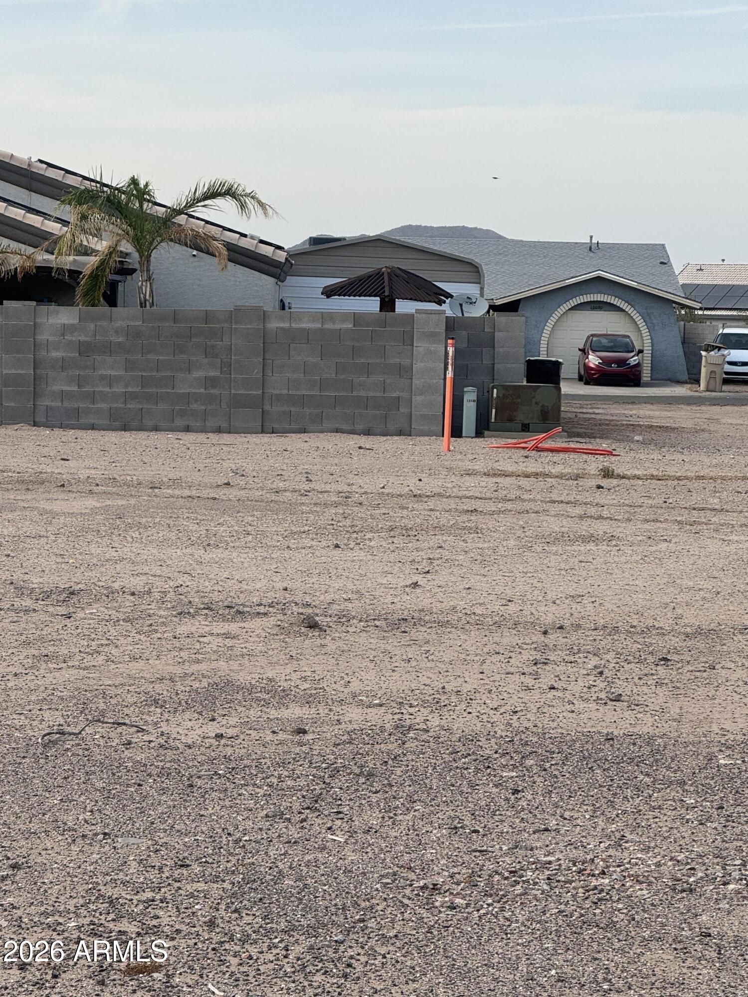 13996 South Tampico Road, Unit 686 Arizona City, AZ 85123 - Photo 3 of 6 a front view of a house with parking