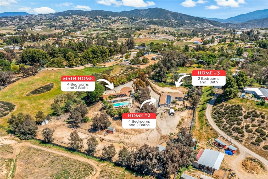 an aerial view of residential houses and city space