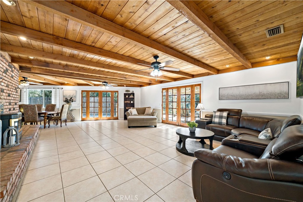 39980 Vía Fernando Temecula, CA 92592 - Photo 17 of 73 a living room with furniture and a chandelier