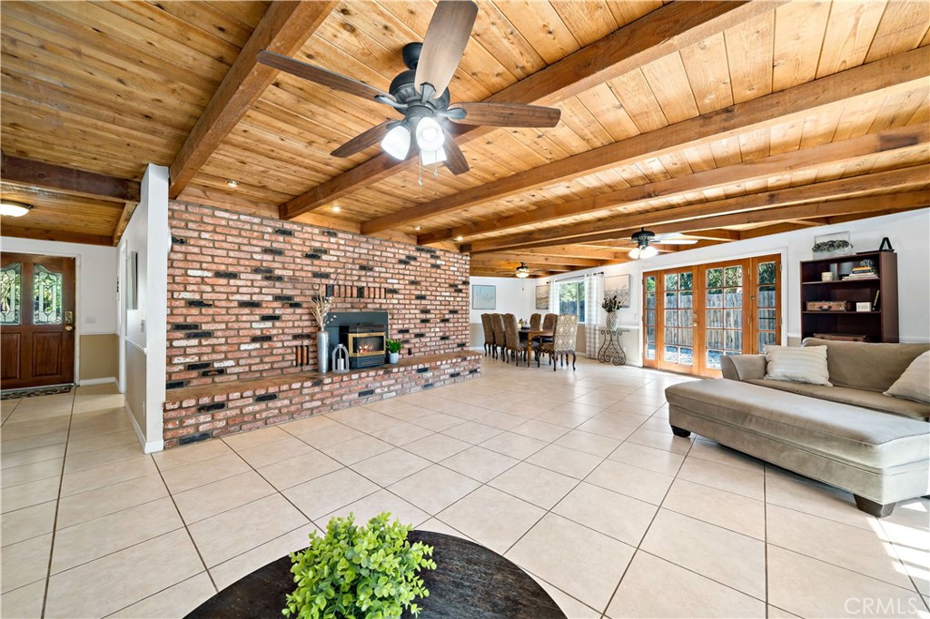 39980 Vía Fernando Temecula, CA 92592 - Photo 20 of 73 a living room with furniture and a fireplace