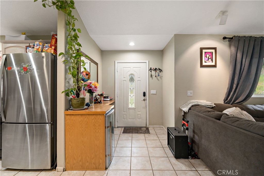 39980 Vía Fernando Temecula, CA 92592 - Photo 59 of 73 a view of a refrigerator and toys in a livingroom
