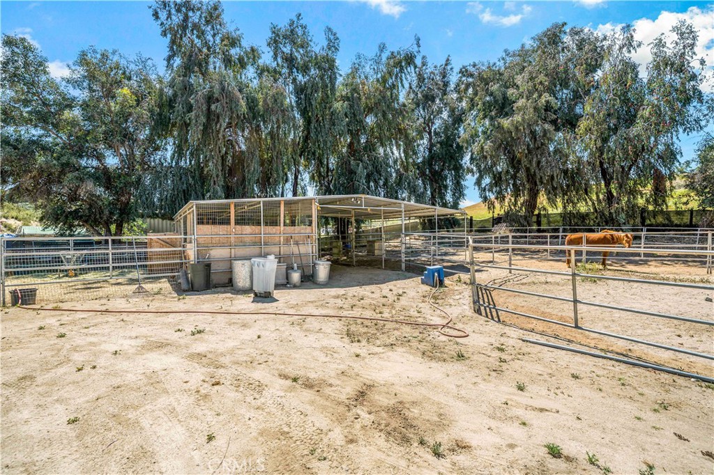 39980 Vía Fernando Temecula, CA 92592 - Photo 9 of 73 a view of a swimming pool with a patio