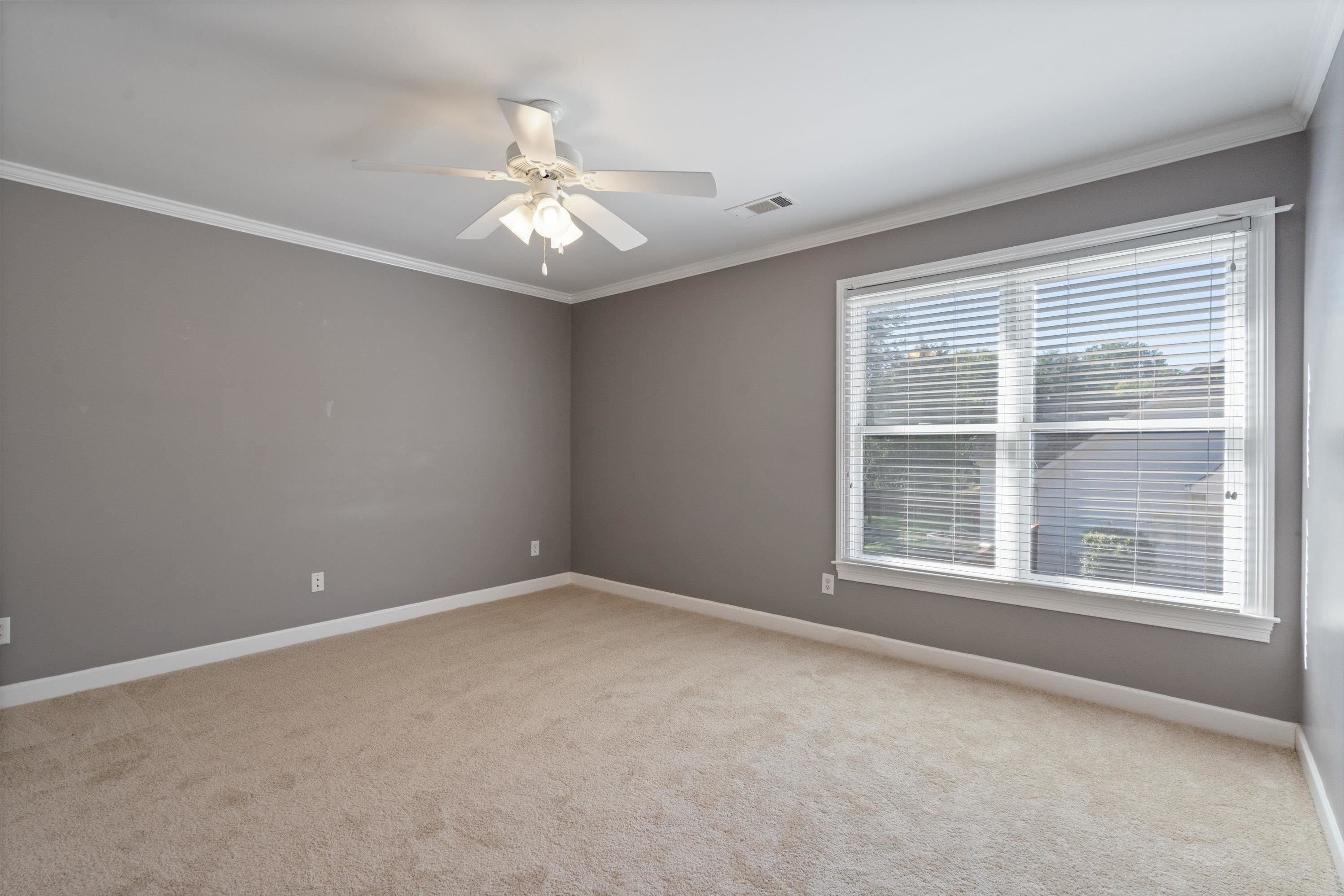 1710 Stillwind Lane Collierville, TN 38017 - Photo 22 of 40 The home's third bedroom is located upstairs with a shared bath