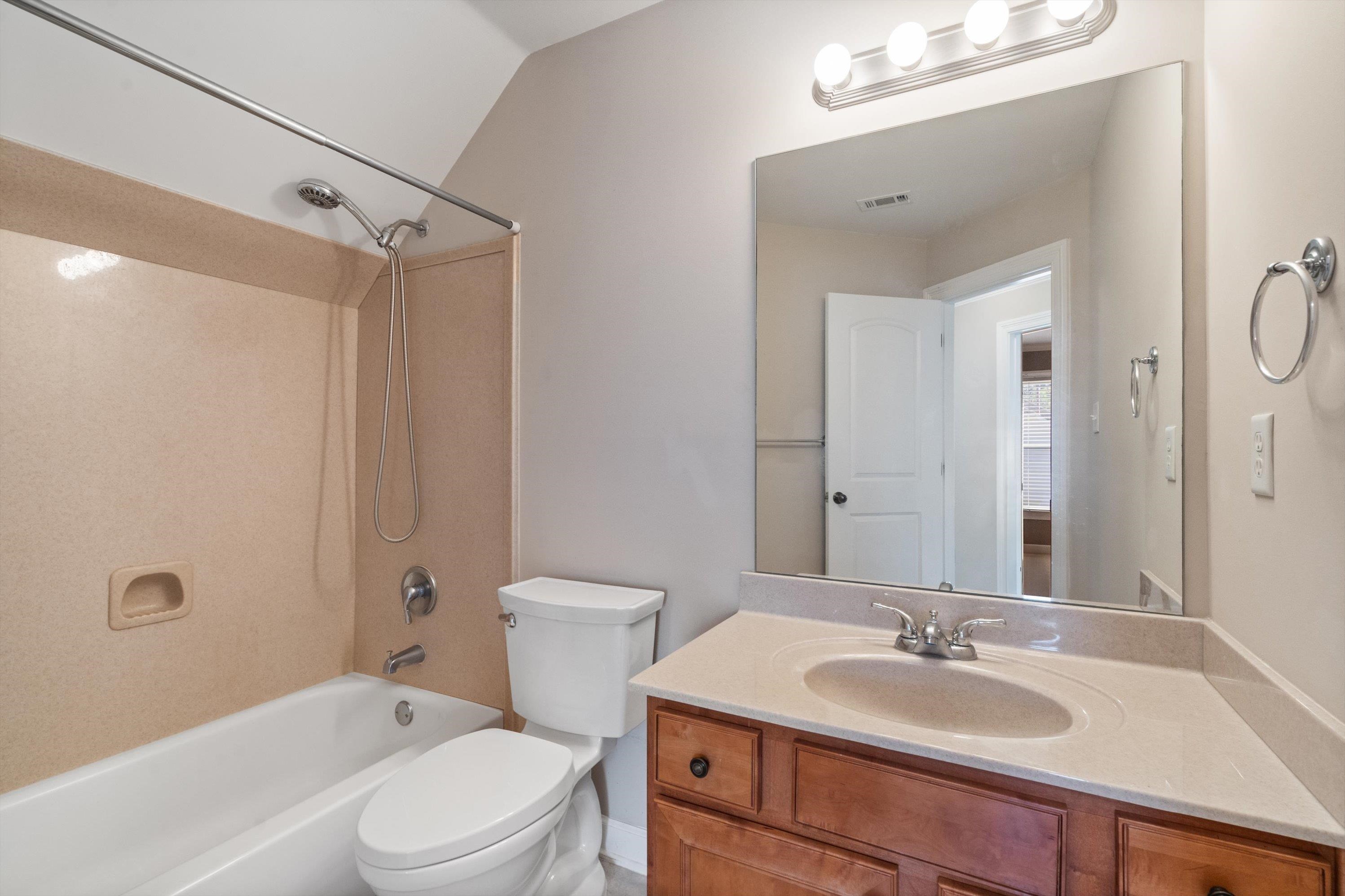 1710 Stillwind Lane Collierville, TN 38017 - Photo 24 of 40 The home's third full bathroom, located upstairs, features a tub-shower combo