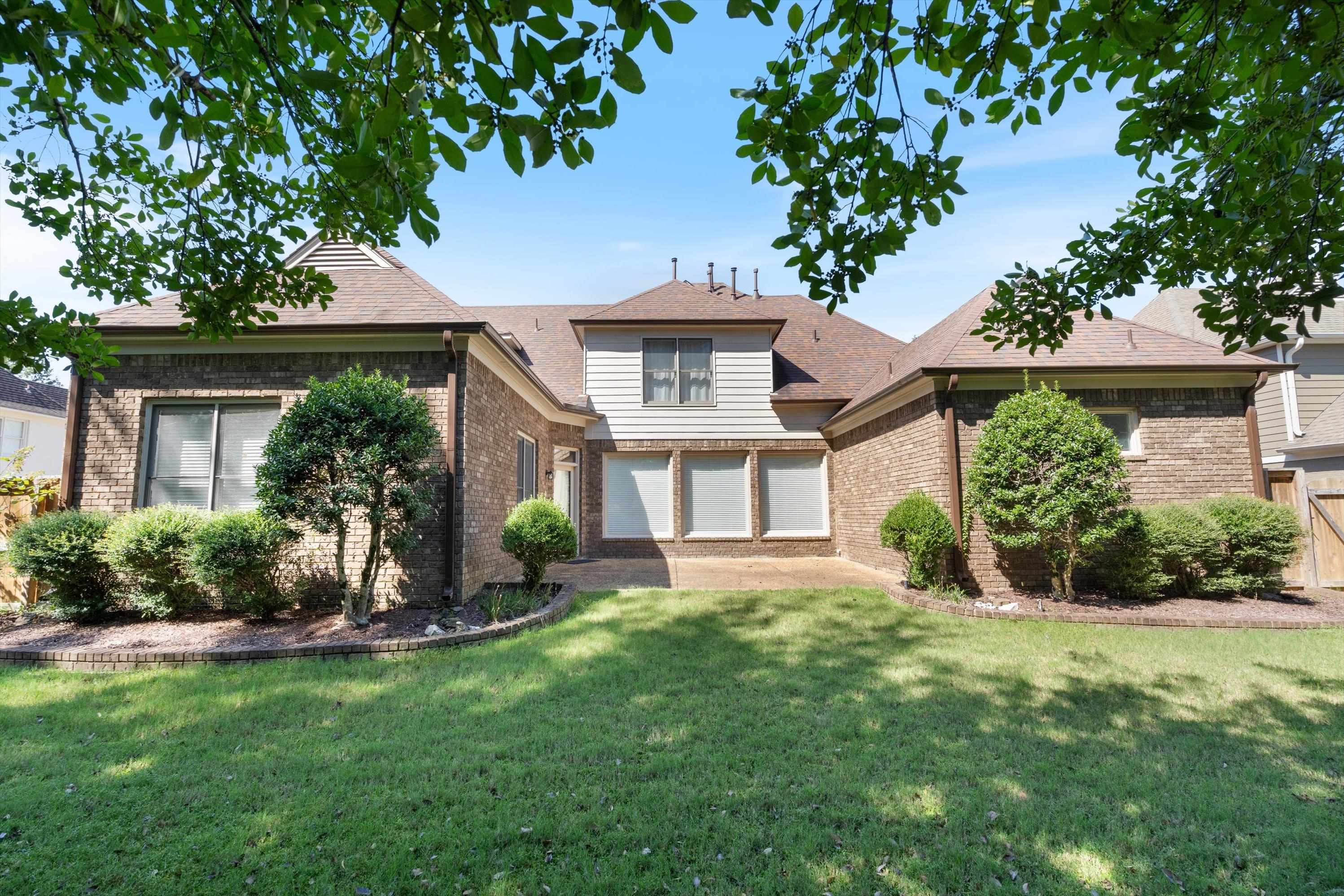 1710 Stillwind Lane Collierville, TN 38017 - Photo 35 of 40 Stately brick home with large, flat grassy backyard