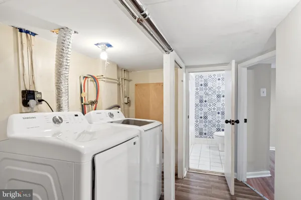 a view of bathroom with dual sinks
