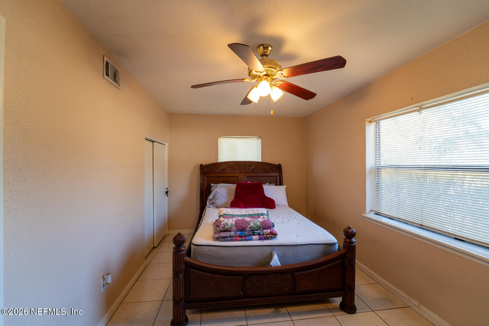 5308 North River Road Jacksonville, FL 32211 - Photo 20 of 25 a room with a chandelier and a rug