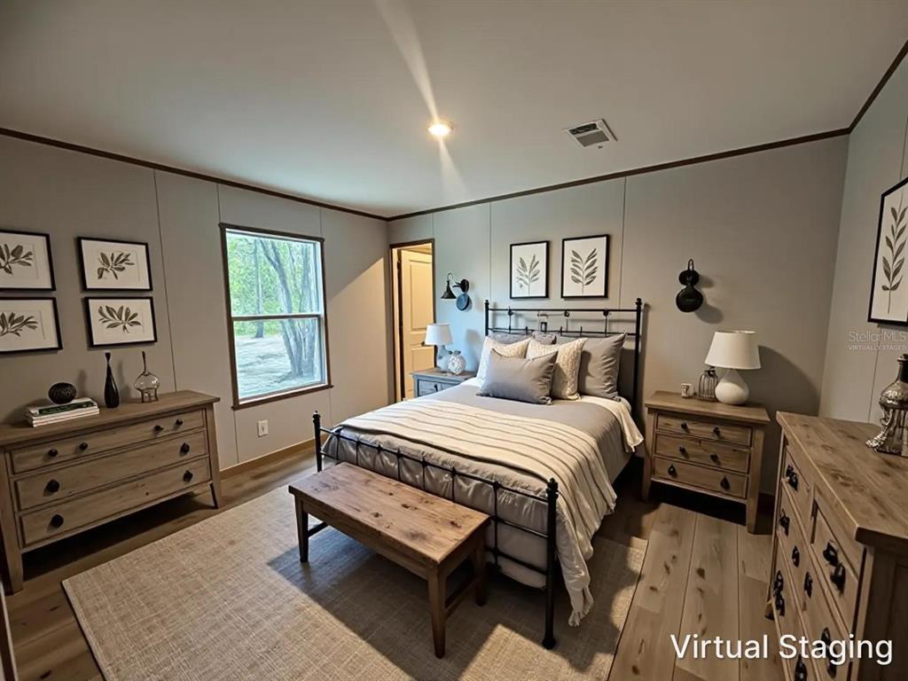 114 Nutmeg Trail Interlachen, FL 32148 - Photo 25 of 33 a bed room with a bed and a window