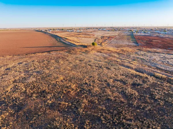 an aerial view of beach and ocean