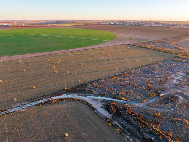 a view of a street with an ocean view