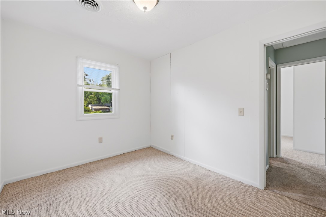 4570 Pymatuning Lake Road Andover, OH 44003 - Photo 21 of 38 Carpeted room with white painted walls